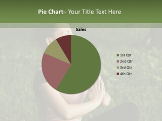 A Woman Is Sitting In The Grass With Her Hands Together PowerPoint Template