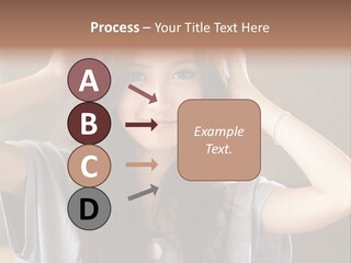 A Woman Is Holding Her Hair In Front Of Her Head PowerPoint Template