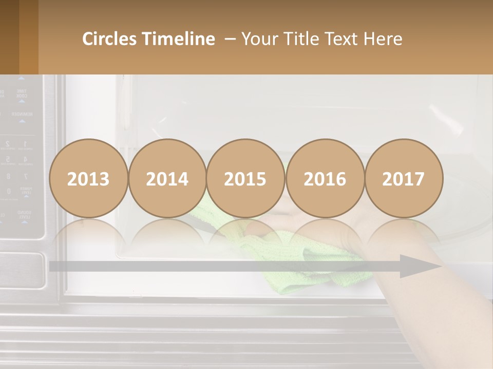 A Person Cleaning A Microwave With A Green Towel PowerPoint Template