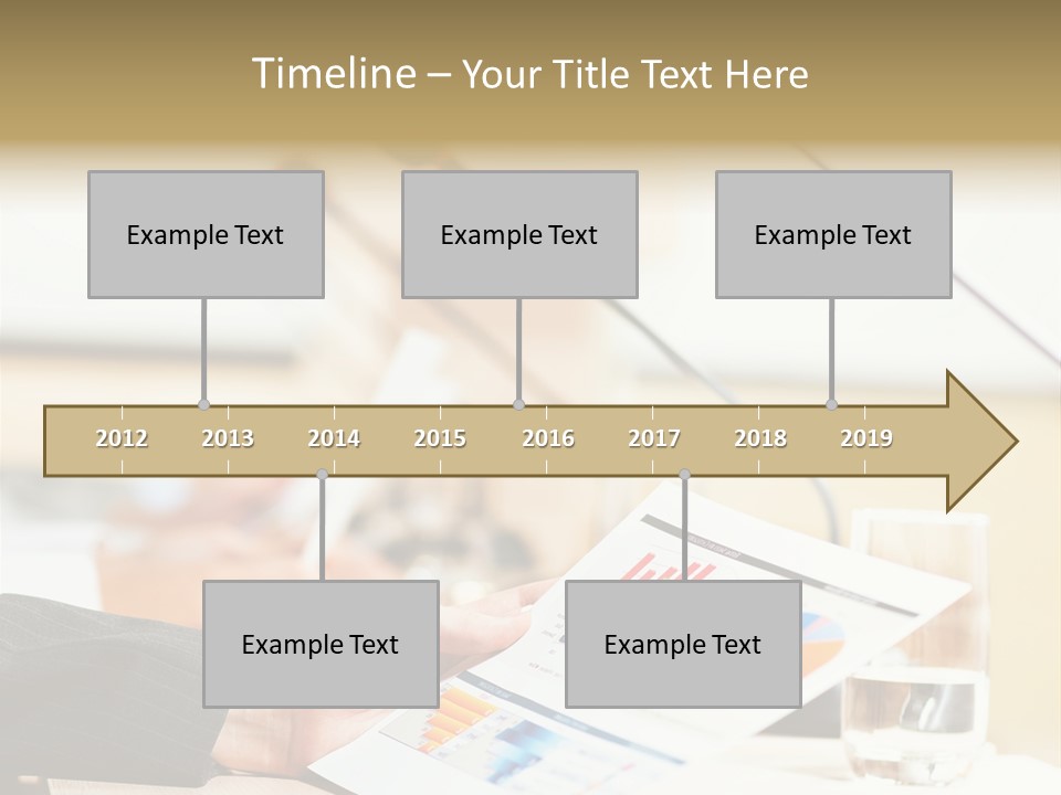A Person Sitting At A Desk With Microphones In Front Of Them PowerPoint Template