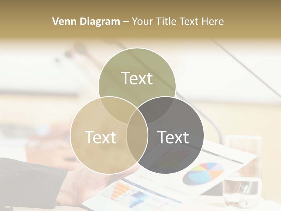 A Person Sitting At A Desk With Microphones In Front Of Them PowerPoint Template