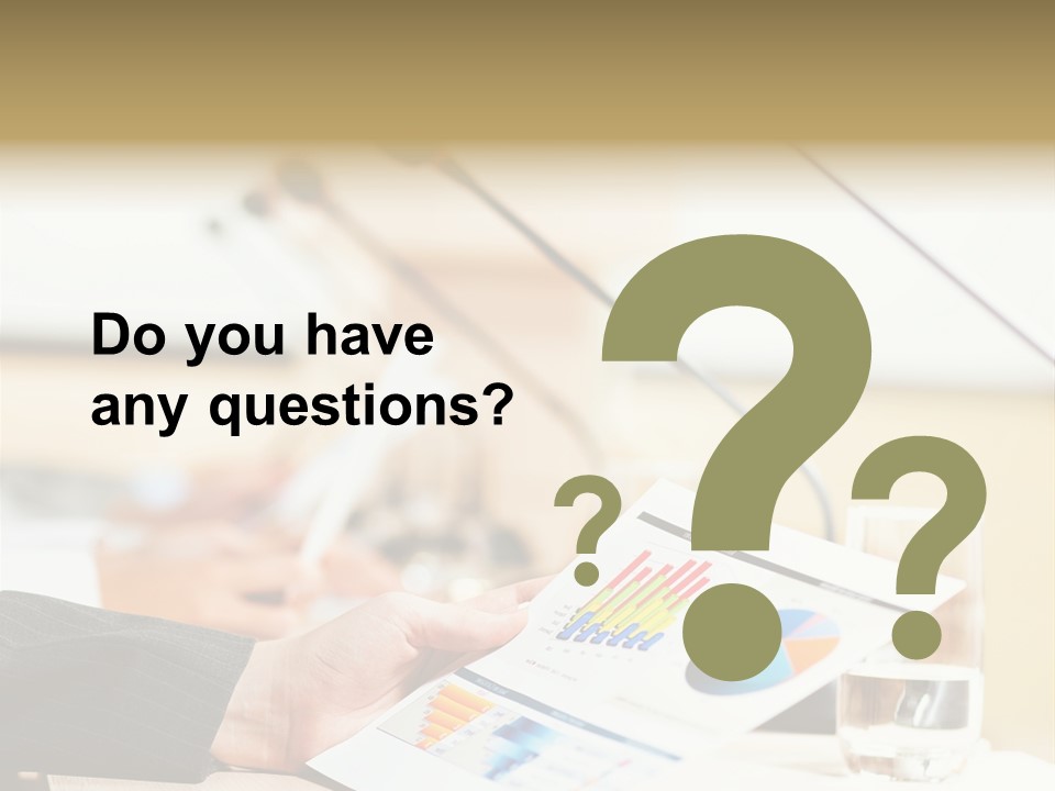 A Person Sitting At A Desk With Microphones In Front Of Them PowerPoint Template