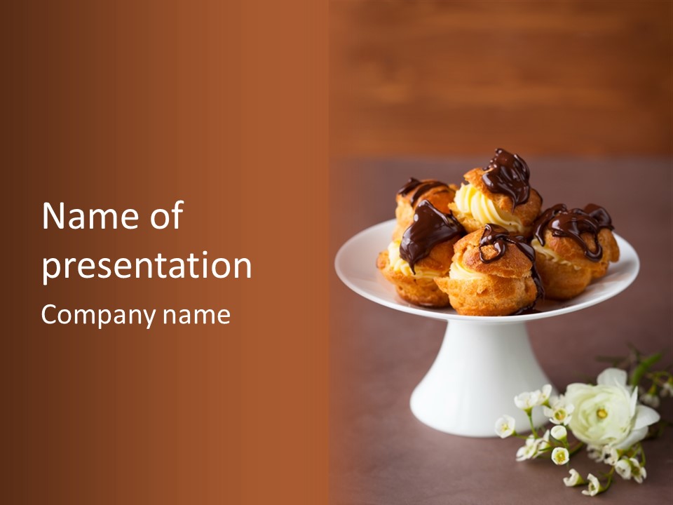 A Plate Of Pastries On A Table With Flowers PowerPoint Template