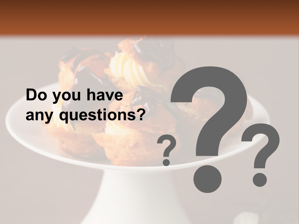 A Plate Of Pastries On A Table With Flowers PowerPoint Template