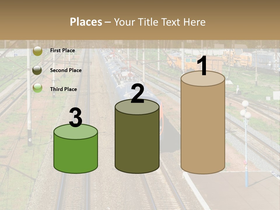 A Train Traveling Down Train Tracks Next To A Field PowerPoint Template