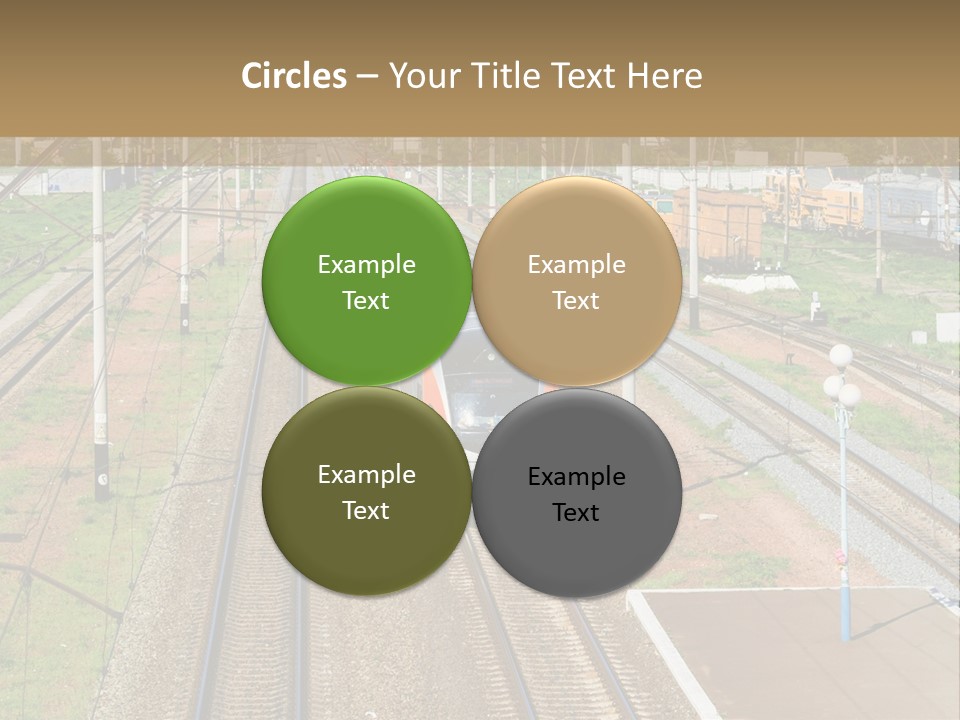 A Train Traveling Down Train Tracks Next To A Field PowerPoint Template