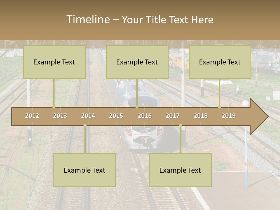 A Train Traveling Down Train Tracks Next To A Field PowerPoint Template