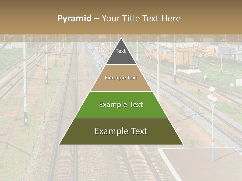 A Train Traveling Down Train Tracks Next To A Field PowerPoint Template