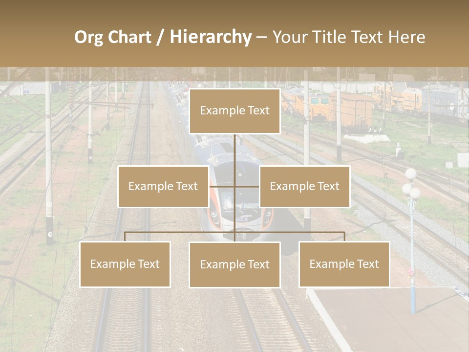 A Train Traveling Down Train Tracks Next To A Field PowerPoint Template