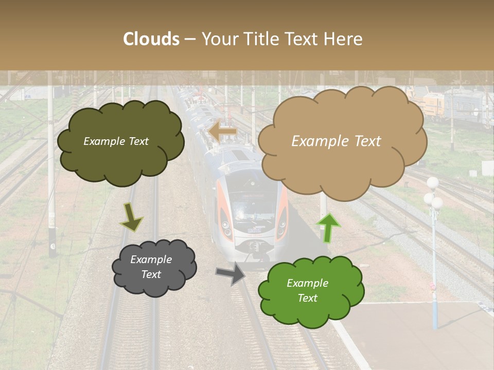 A Train Traveling Down Train Tracks Next To A Field PowerPoint Template