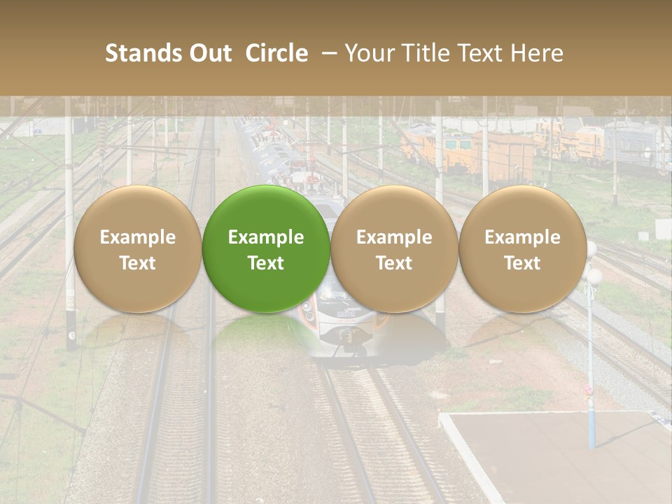 A Train Traveling Down Train Tracks Next To A Field PowerPoint Template
