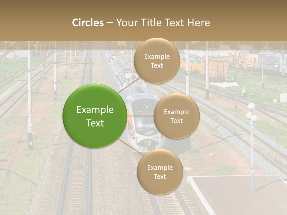 A Train Traveling Down Train Tracks Next To A Field PowerPoint Template