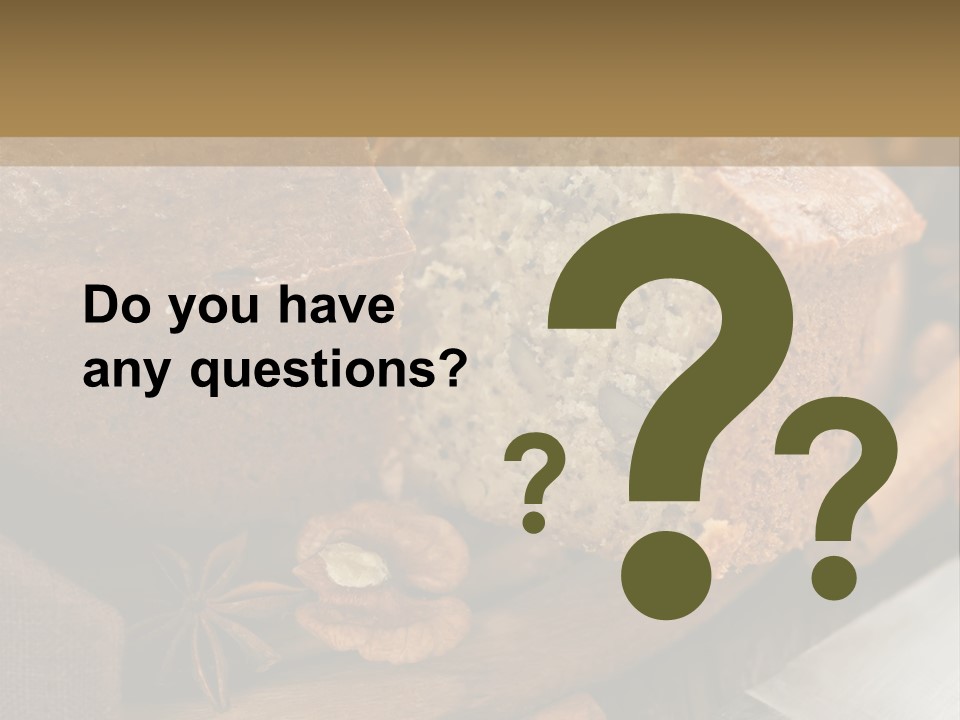 A Loaf Of Bread With Nuts On A Cutting Board PowerPoint Template