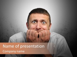 A Man Covering His Mouth With His Hands PowerPoint Template