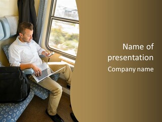 A Man Sitting On A Train Using A Laptop PowerPoint Template