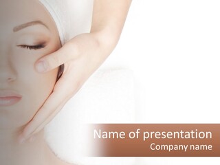 A Woman Getting A Facial Massage With A Towel On Her Head PowerPoint Template