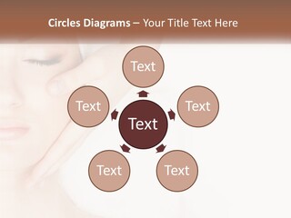 A Woman Getting A Facial Massage With A Towel On Her Head PowerPoint Template