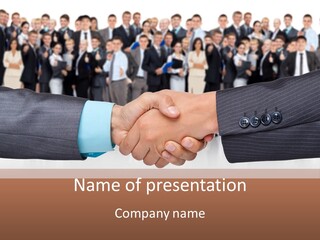 Two Men Shaking Hands In Front Of A Group Of People PowerPoint Template