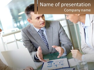 A Group Of People Sitting Around A Table Talking PowerPoint Template