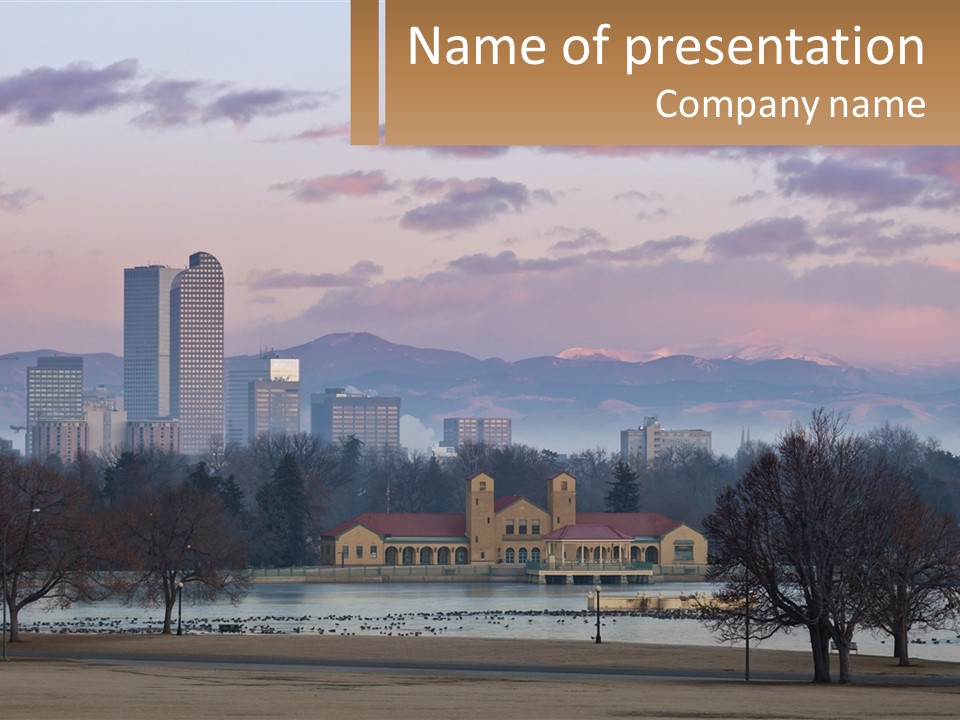A Picture Of A City With Mountains In The Background PowerPoint Template