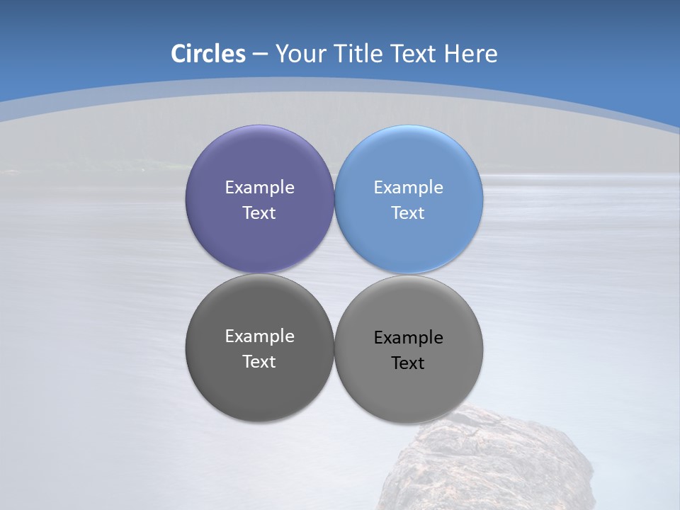 A Lake With Rocks In The Water And Mountains In The Background PowerPoint Template