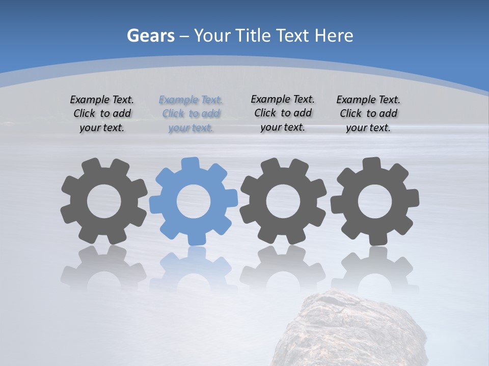 A Lake With Rocks In The Water And Mountains In The Background PowerPoint Template