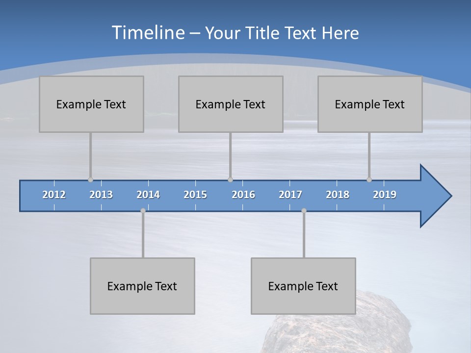 A Lake With Rocks In The Water And Mountains In The Background PowerPoint Template