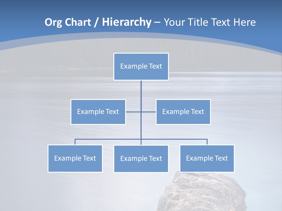 A Lake With Rocks In The Water And Mountains In The Background PowerPoint Template