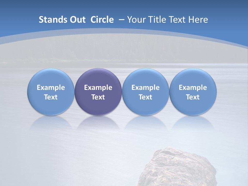 A Lake With Rocks In The Water And Mountains In The Background PowerPoint Template