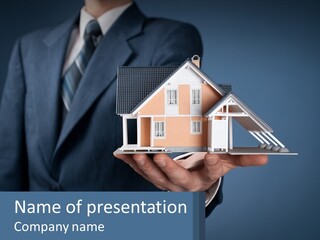 A Man In A Suit Holding A Model Of A House PowerPoint Template