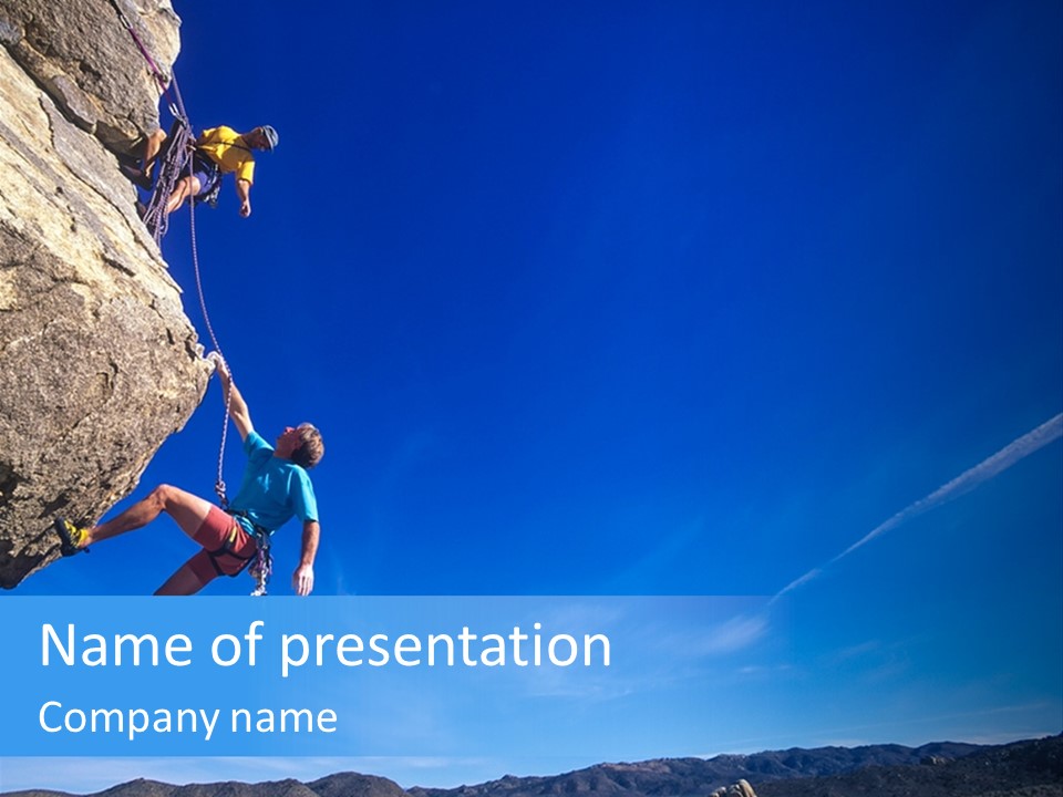 A Man Climbing Up The Side Of A Mountain PowerPoint Template