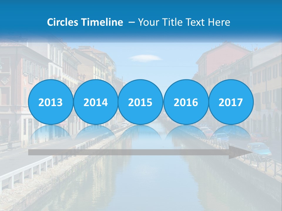 A River Running Through A City Next To Tall Buildings PowerPoint Template