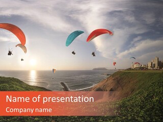 A Group Of Paraglides Flying Over A Body Of Water PowerPoint Template