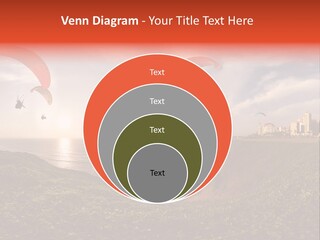 A Group Of Paraglides Flying Over A Body Of Water PowerPoint Template
