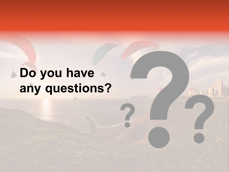 A Group Of Paraglides Flying Over A Body Of Water PowerPoint Template