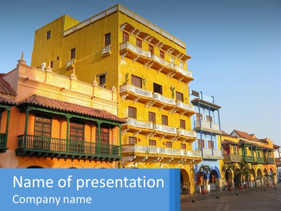 A Yellow Building With Balconies And Balconies On It PowerPoint Template