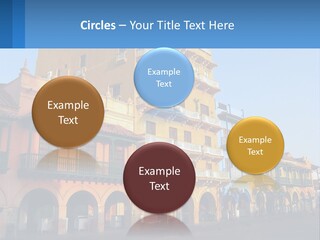A Yellow Building With Balconies And Balconies On It PowerPoint Template