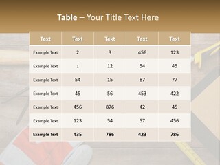 A Wooden Table Topped With Tools And Paper PowerPoint Template
