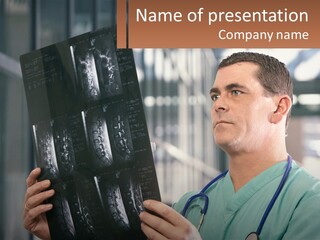 A Man Holding Up A Medical Powerpoint Presentation PowerPoint Template