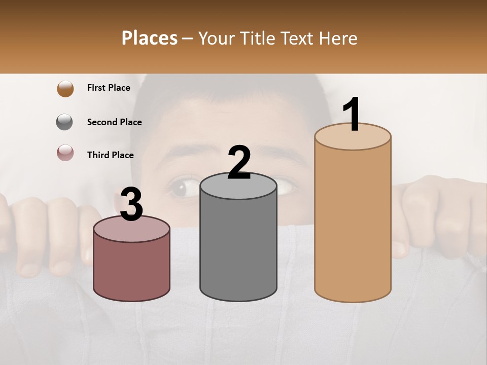 A Boy Peeking Over A Pillow With His Eyes Wide Open PowerPoint Template