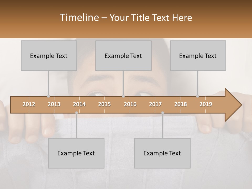 A Boy Peeking Over A Pillow With His Eyes Wide Open PowerPoint Template