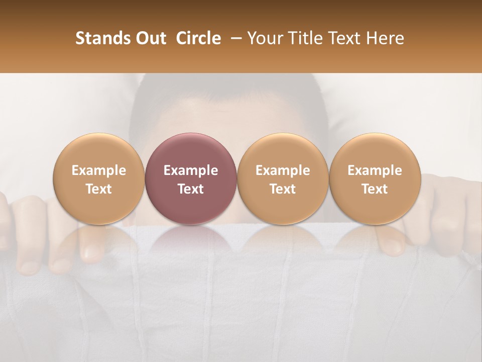 A Boy Peeking Over A Pillow With His Eyes Wide Open PowerPoint Template