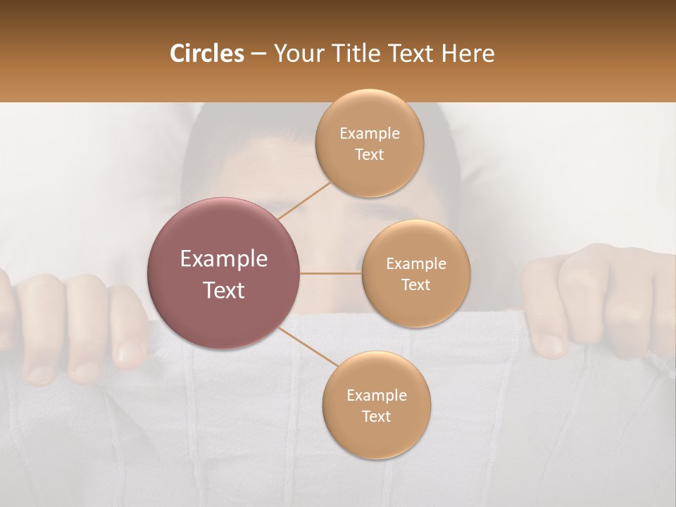 A Boy Peeking Over A Pillow With His Eyes Wide Open PowerPoint Template