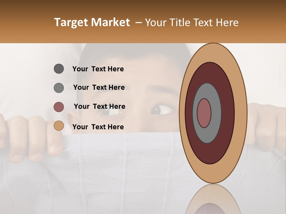 A Boy Peeking Over A Pillow With His Eyes Wide Open PowerPoint Template