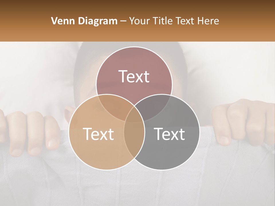 A Boy Peeking Over A Pillow With His Eyes Wide Open PowerPoint Template