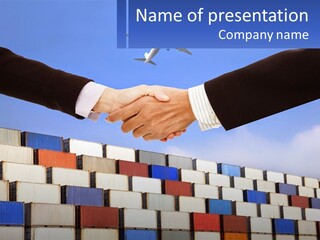Two People Shaking Hands In Front Of A Wall Of Shipping Containers PowerPoint Template