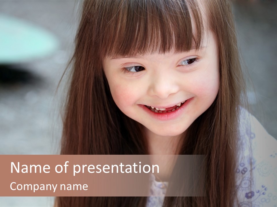 A Young Girl With Long Brown Hair Smiles At The Camera PowerPoint Template