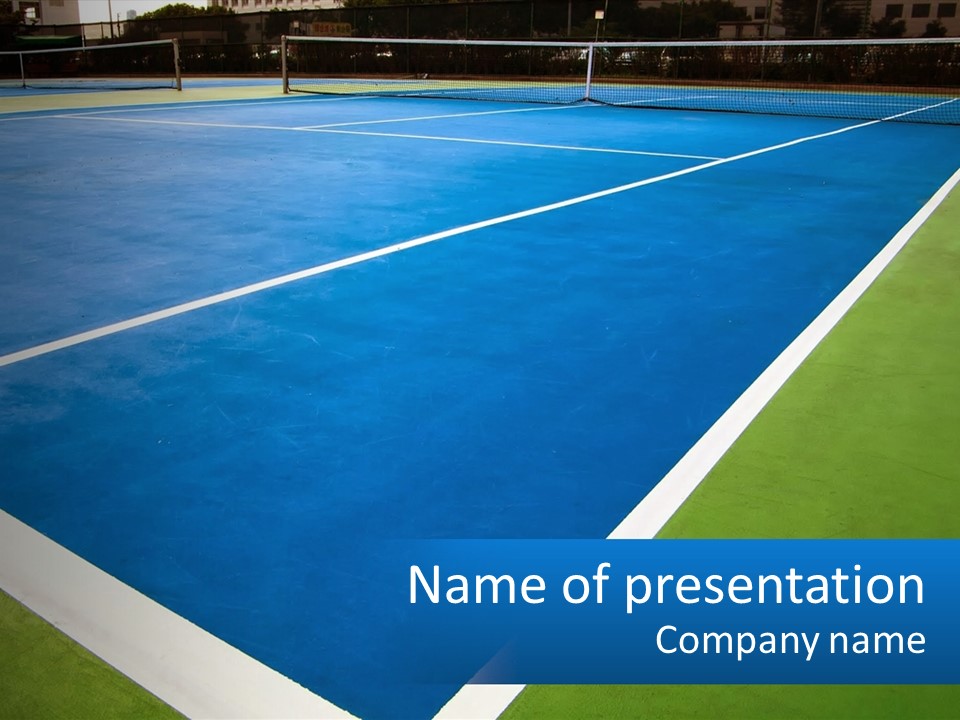A Tennis Court With A Blue And Green Court PowerPoint Template