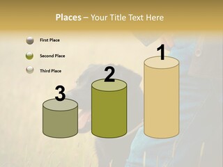 A Person Holding A Black Dog In A Field PowerPoint Template