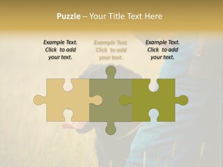 A Person Holding A Black Dog In A Field PowerPoint Template